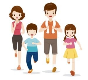Photo of two parents and two children running together.