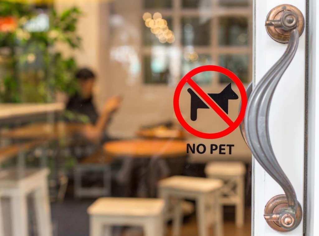 Symbols of No pets on the coffee shop door