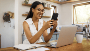 Woman on phone Text/SMS Kingsley Survey Delivery