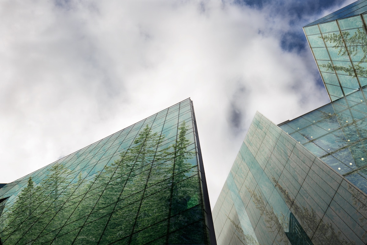 Why ESG is important for investors image of greenery on commercial real estate building