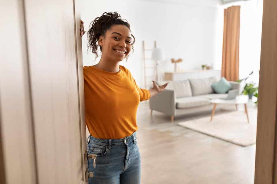Cheerful African American Woman Opening Door And Gesturing Welcoming You To Come In Smiling To Camera Standing At Home. Hospitality, Real Estate Ownership And Purchase Concept
Cheerful African Woman Opening Door Welcoming You Standing At Home
welcome, hospitality, woman, african american, open, door, inviting, real estate, home, female, background, greeting, meet, lifestyle, apartment, service, house, property, flat, people, indoor, ownership, buying, rent, lady, joy, happy, gesture, interior, slow motion, young, millennial, adult, smile, housing, moving, black, leisure, purchase, relocation, mortgage, domestic, concept, hospitable, friendly, rental, invite, come in, look camera