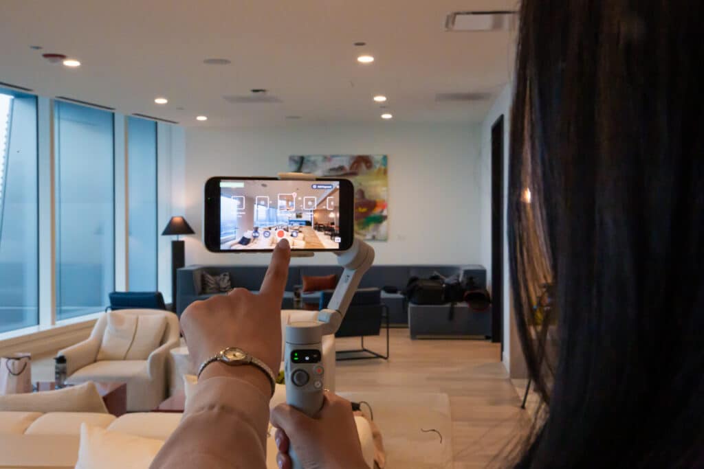 property manager using realync software to film virtual apartment tour