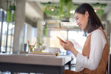 Close up of leasing agent responding to reviews in her office