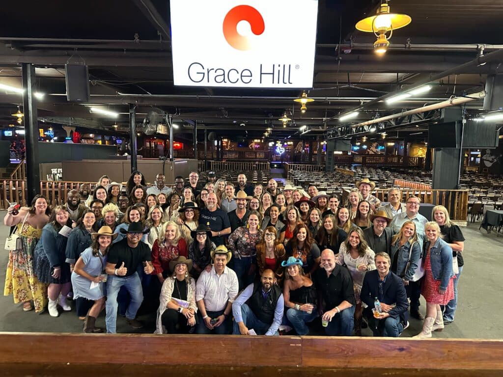 group photo of Grace Hill's team at Performance Summit, Billy Bob's event