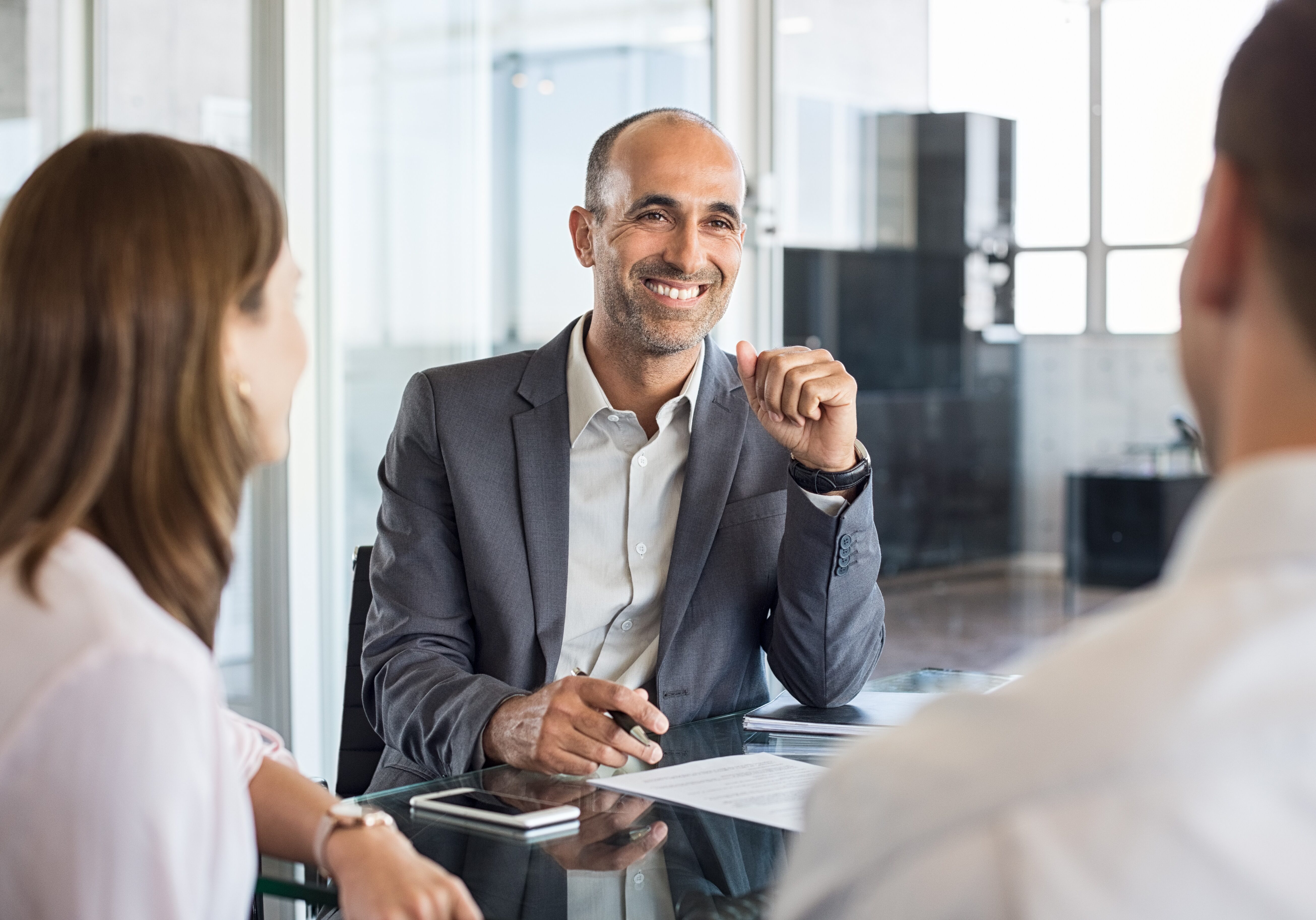 Happy financial agent smiling