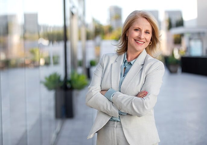 Headshot of attractive middle aged business woman professional,
