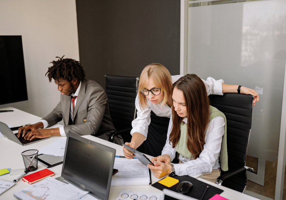 employee using laptop to onboard in multifamily
