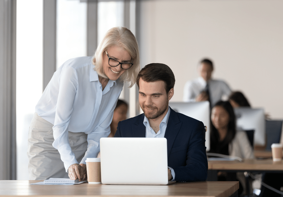 instructor and employee completing online training in property management