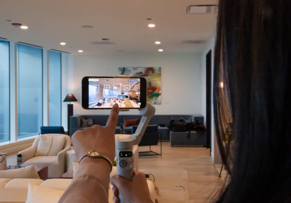 property manager using realync software to film virtual apartment tour