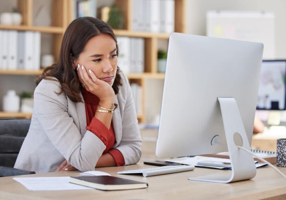 Bored, burnout or tired leasing woman is sleepy in the office from deadlines, overworked or overwhelmed.