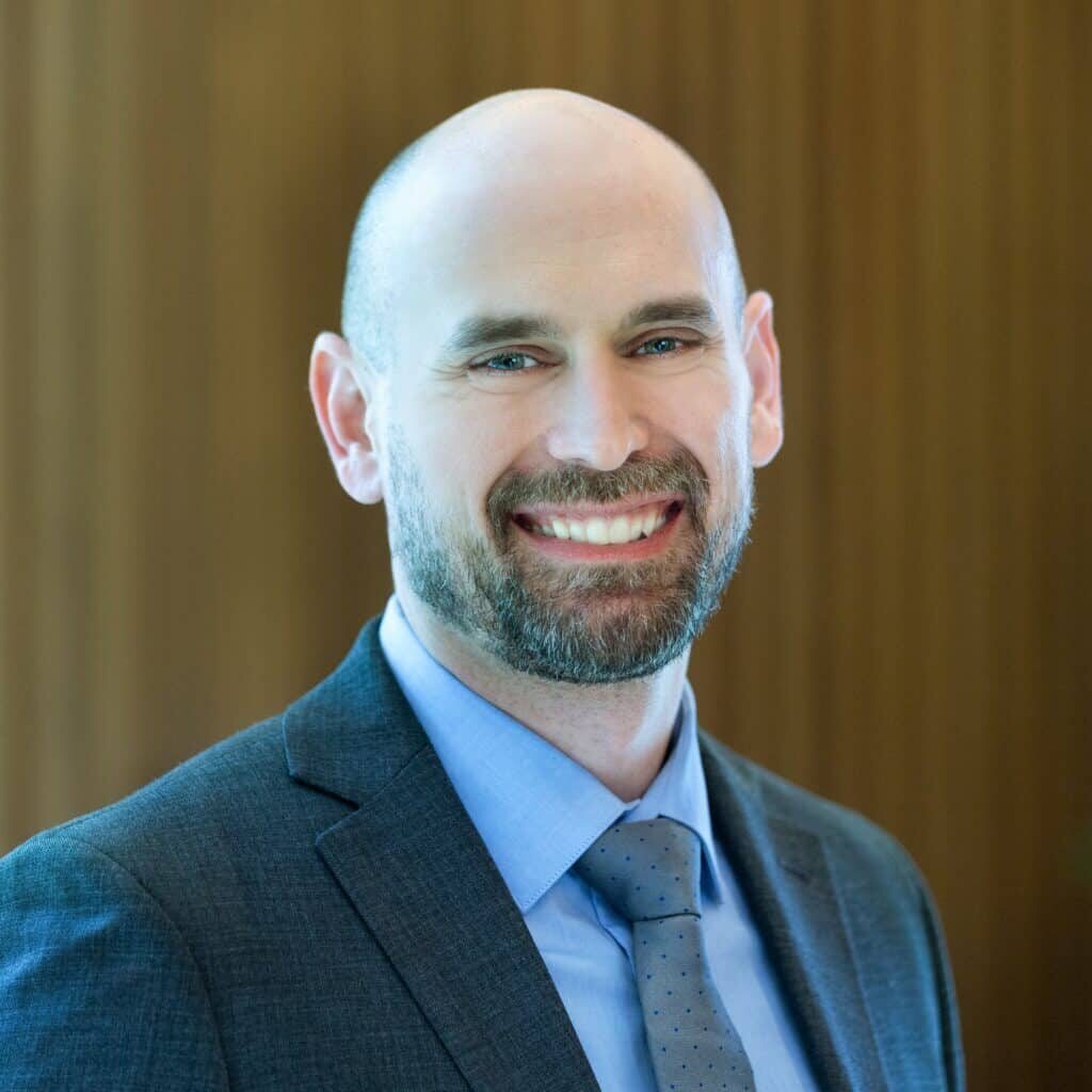 headshot of joe davis, director of customer success at Grace Hill