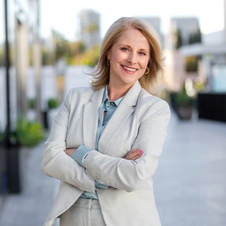 multifamily training and development leader Headshot of attractive middle aged woman who is a training and development professional